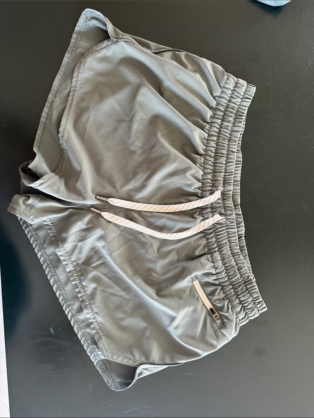 Vuori Olive Green Athletic Drawstring Shorts with Cream Drawcord